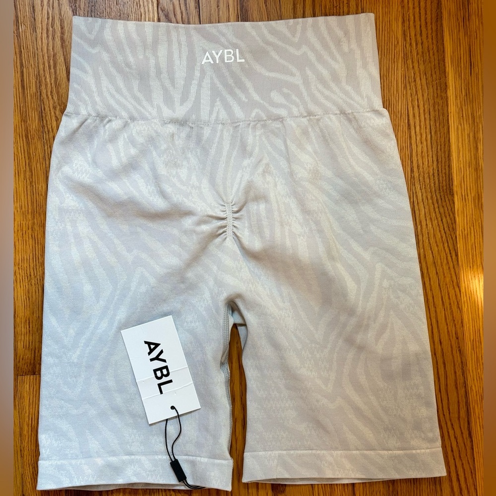 Light gray animal print AYBL shorts size medium. Brand new with tags